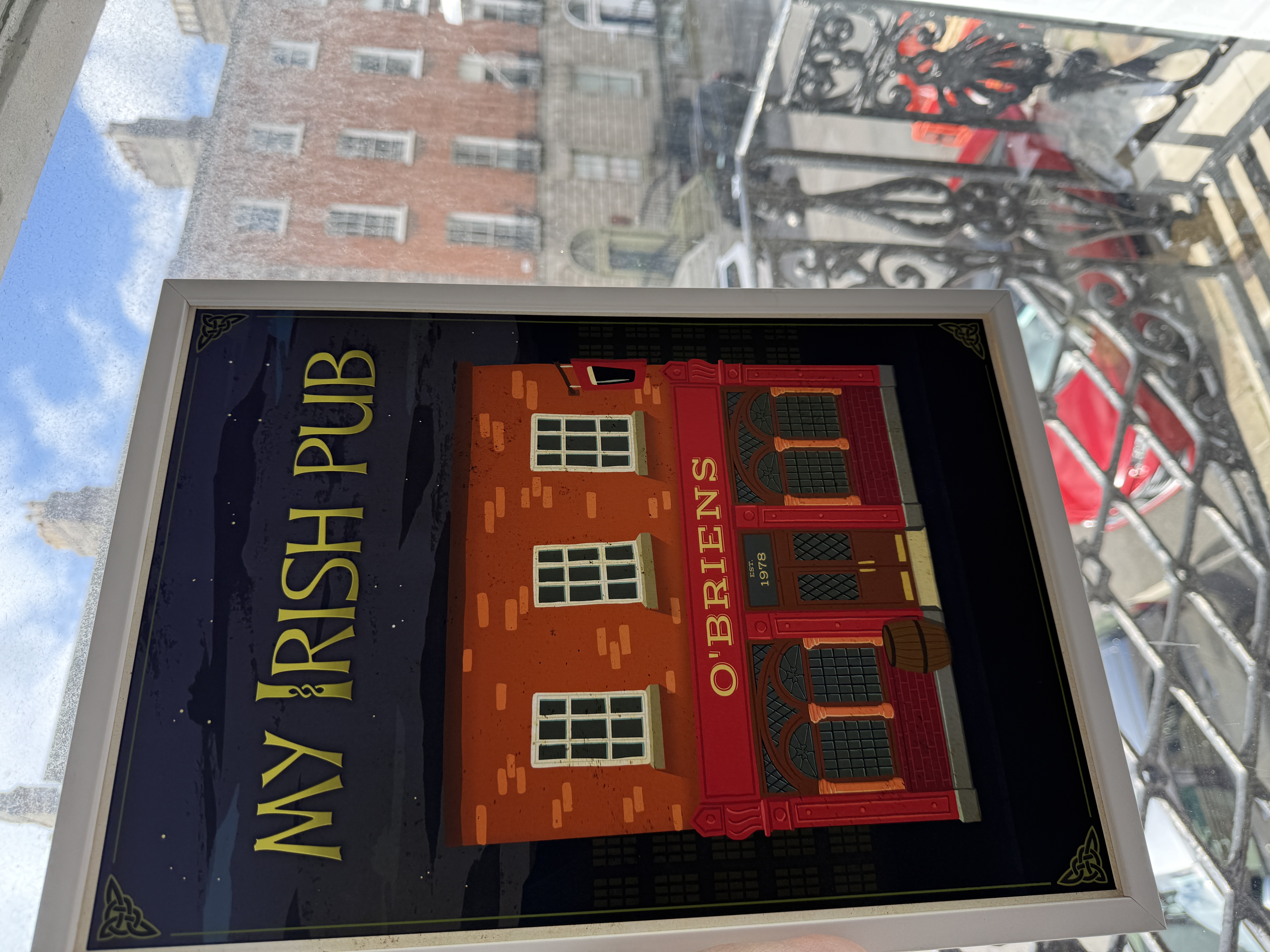 O'Briens print on Dublin balcony